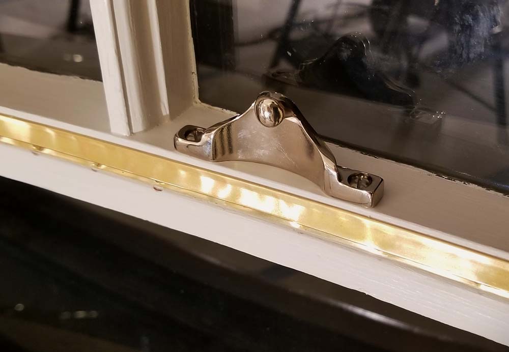 Double hung window - chrome sash lock & spring bronze weatherstrip